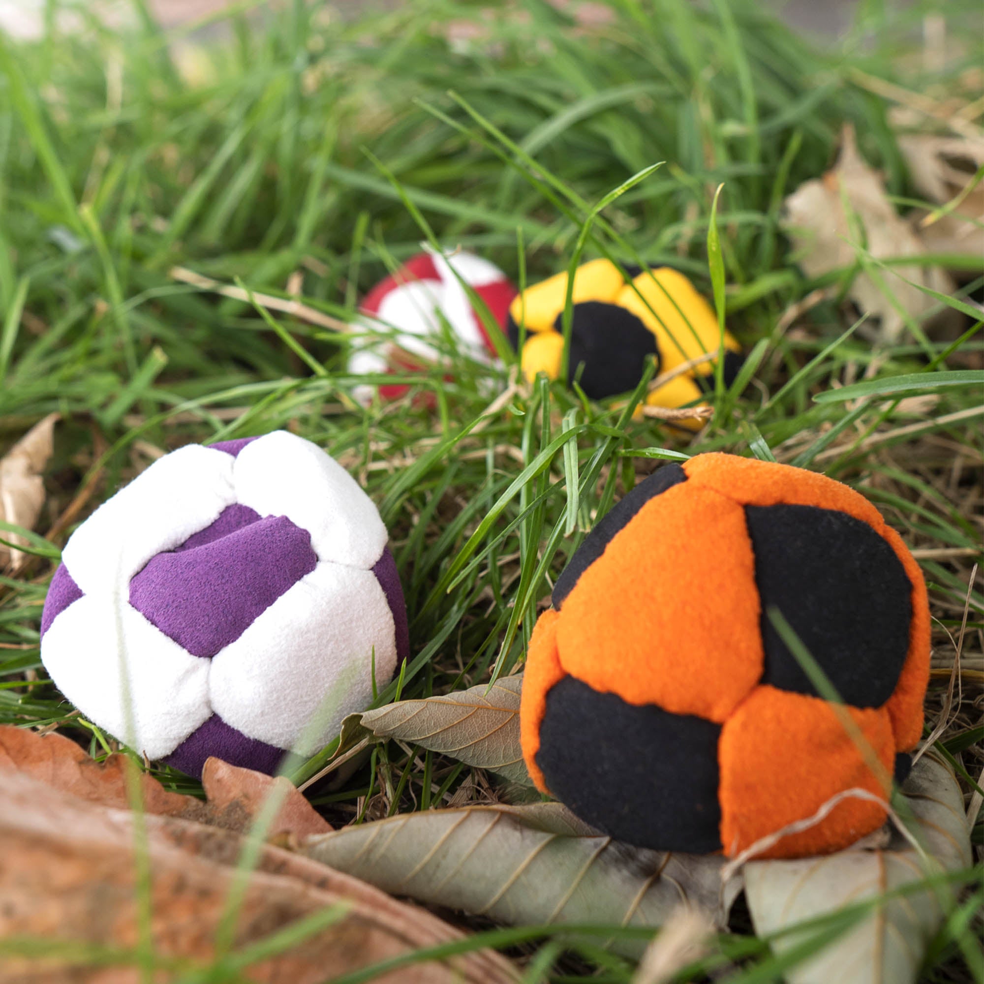 Firetoys hacky sacks in grass