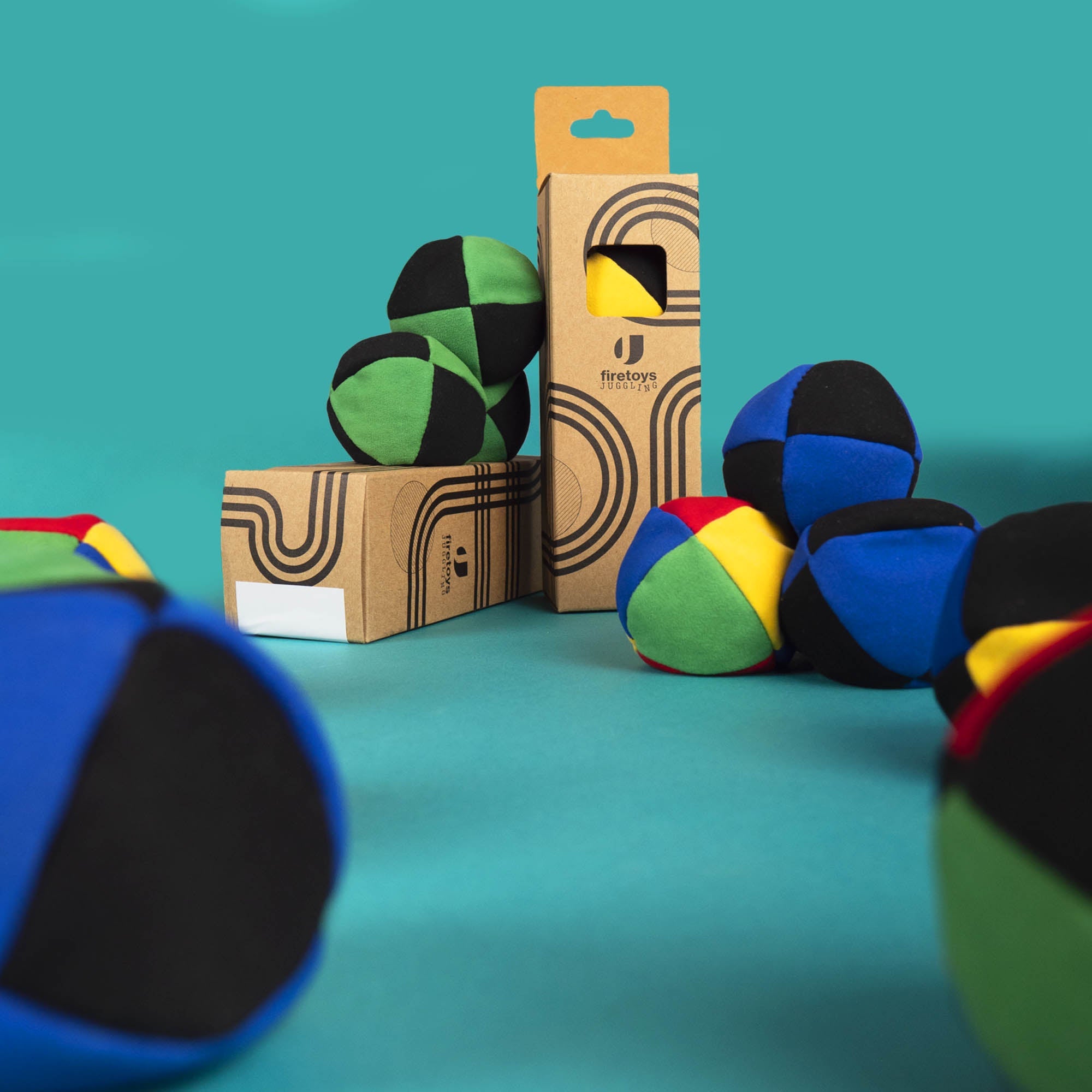 Hero shot, mix of packaged and spilled juggling balls