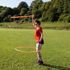 person spinning two hoops