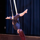 performer using cotton covered aerial straps