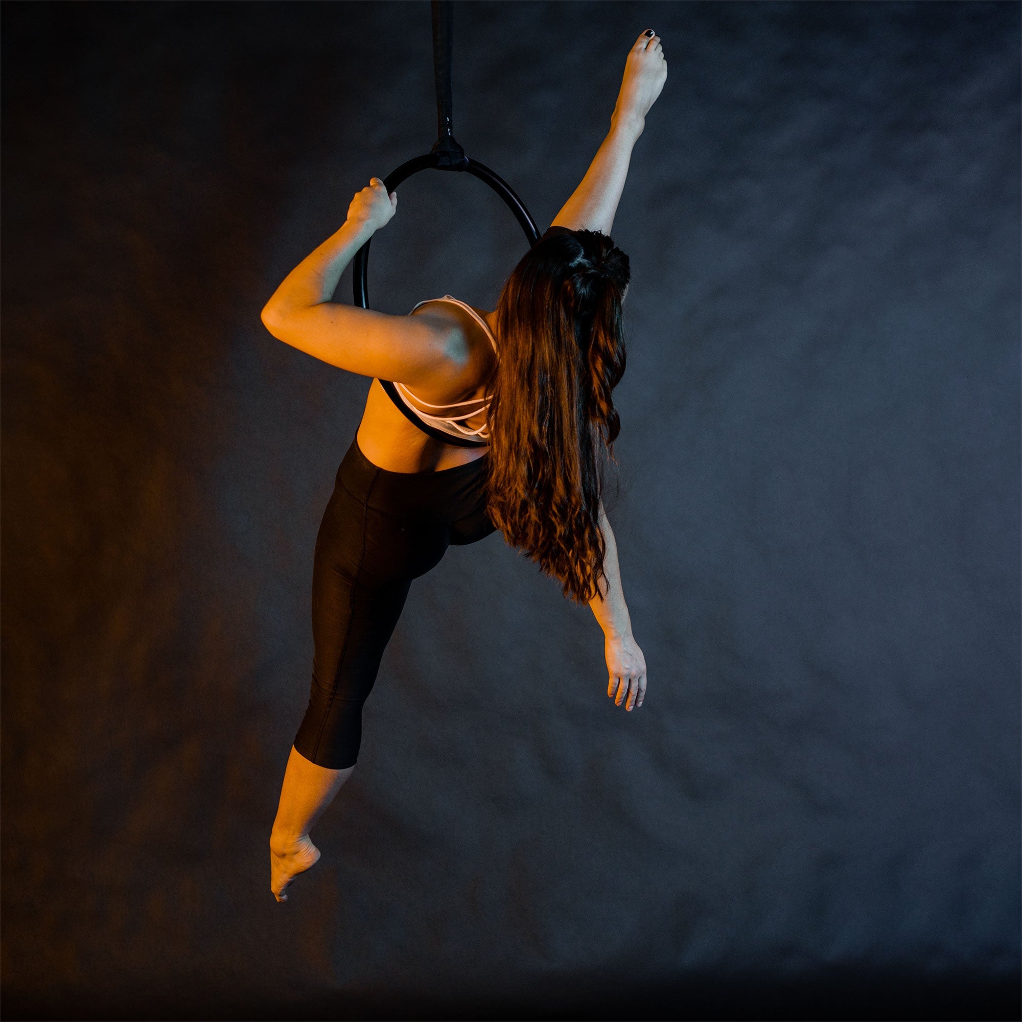 performer on mini aerial hoop