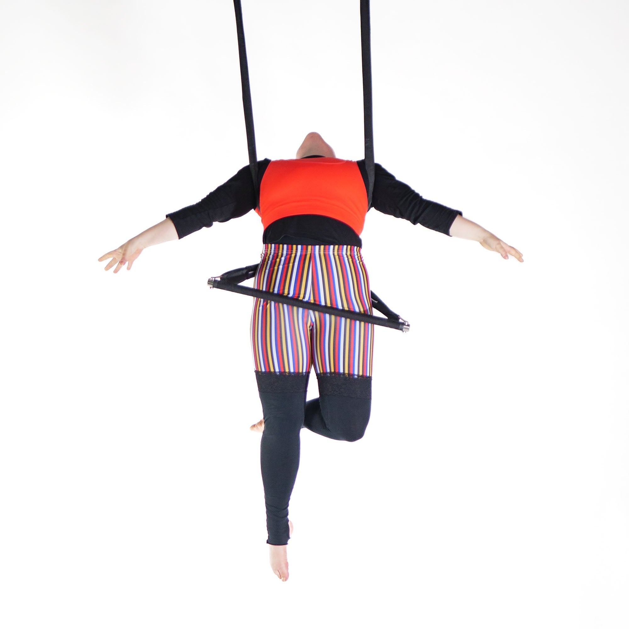 performer on shackle trapeze